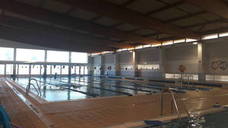 Choque de intereses para liquidar el contrato de la piscina cubierta