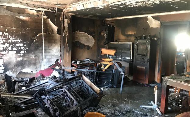 Grave incendio en una vivienda de la calle Pintor Fausto Olivares