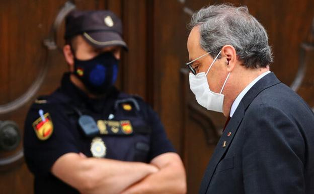 Torra, procesado por una segunda pancarta